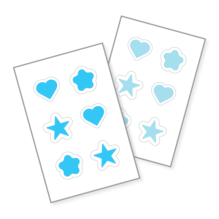 Assortment of stickers on a sheet with different shapes and different sizes